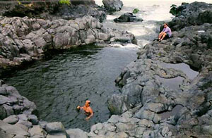 Swimming at Seven Falls, Haleakala National Park, Maui (credit: Emily Fancher)